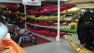 We employ a system of both wooden racks and hanging straps.