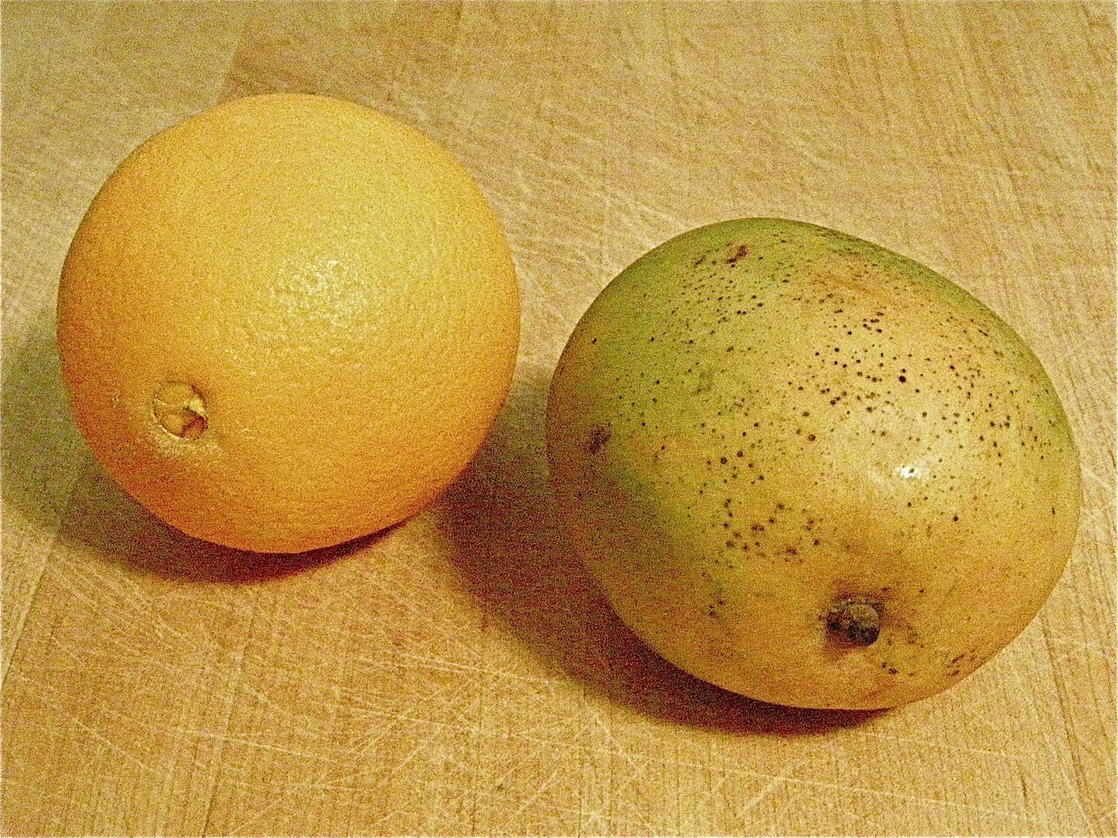 eat with a spoon mango, orange and rum punch