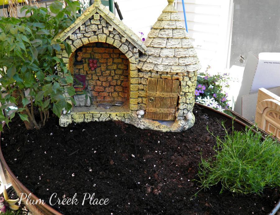 Plum Creek Place Playing in the Fairy Garden Plum Creek Place Playing in the Fairy Garden
