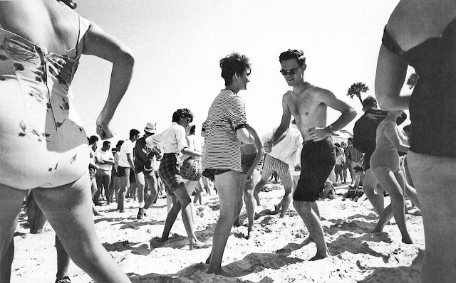 vintage photograph of couples dancing on the beach