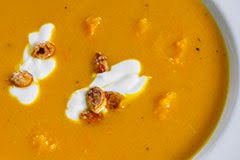Potimarron Squash Soup w/ Saffron, Orange Zest and Caramelized Seeds