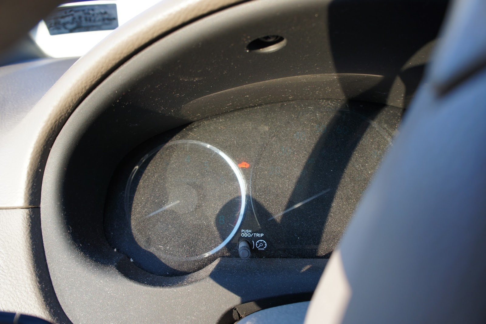 Four Front Doors TIP Keep a Swiffer Duster in Your Car!