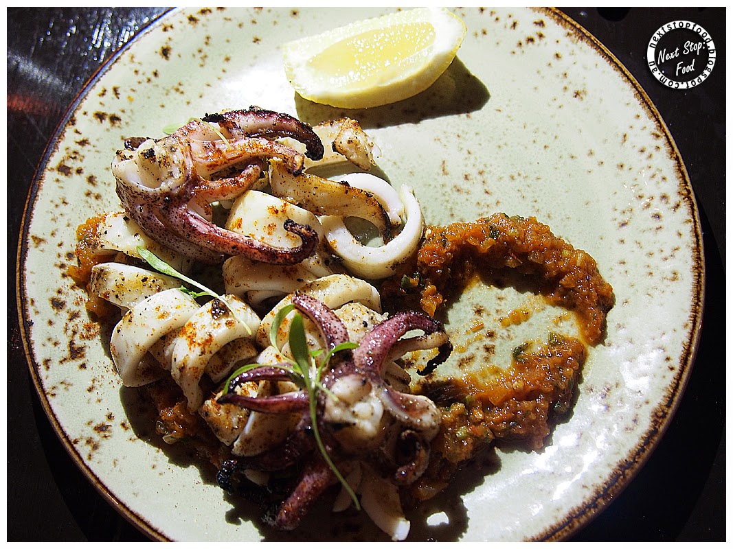 Wood Fire Grilled Calamari with Chiltomate relish Next Stop: Food Pony Lounge and Dining