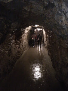 Walking inside the tunnel of Postojna Caves in Slovenia.
