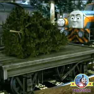 The impressive winter holiday decoration trees were rested on Thomas and friends flatbed wagon cars