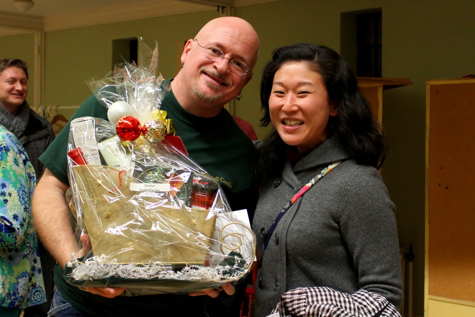 Door prize winner grins with presentation of gorgeous gift basket Door prize winner grins with presentation of gorgeous gift basket