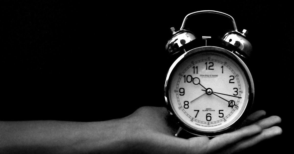 Watch in the hand black background Dream Wallpapers