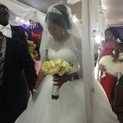 Lililan Esoro and Ubi Franklin white wedding photos
