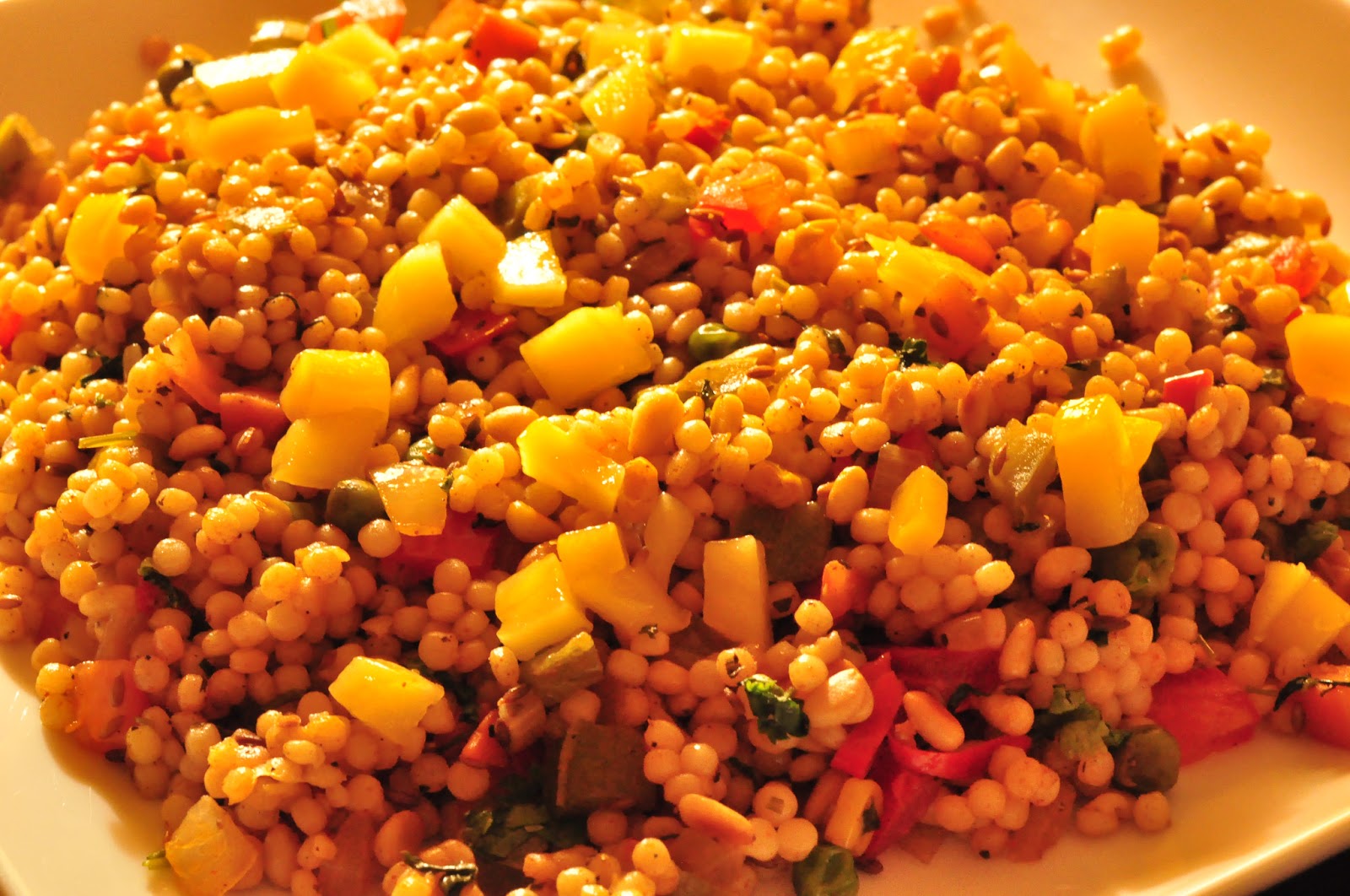 Spice Infused Pearl Couscous Salad with Fresh Mango, Pine nuts & Cilantro
