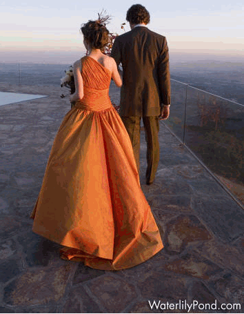 This orange wedding dress is certainly a vision for a fall wedding
