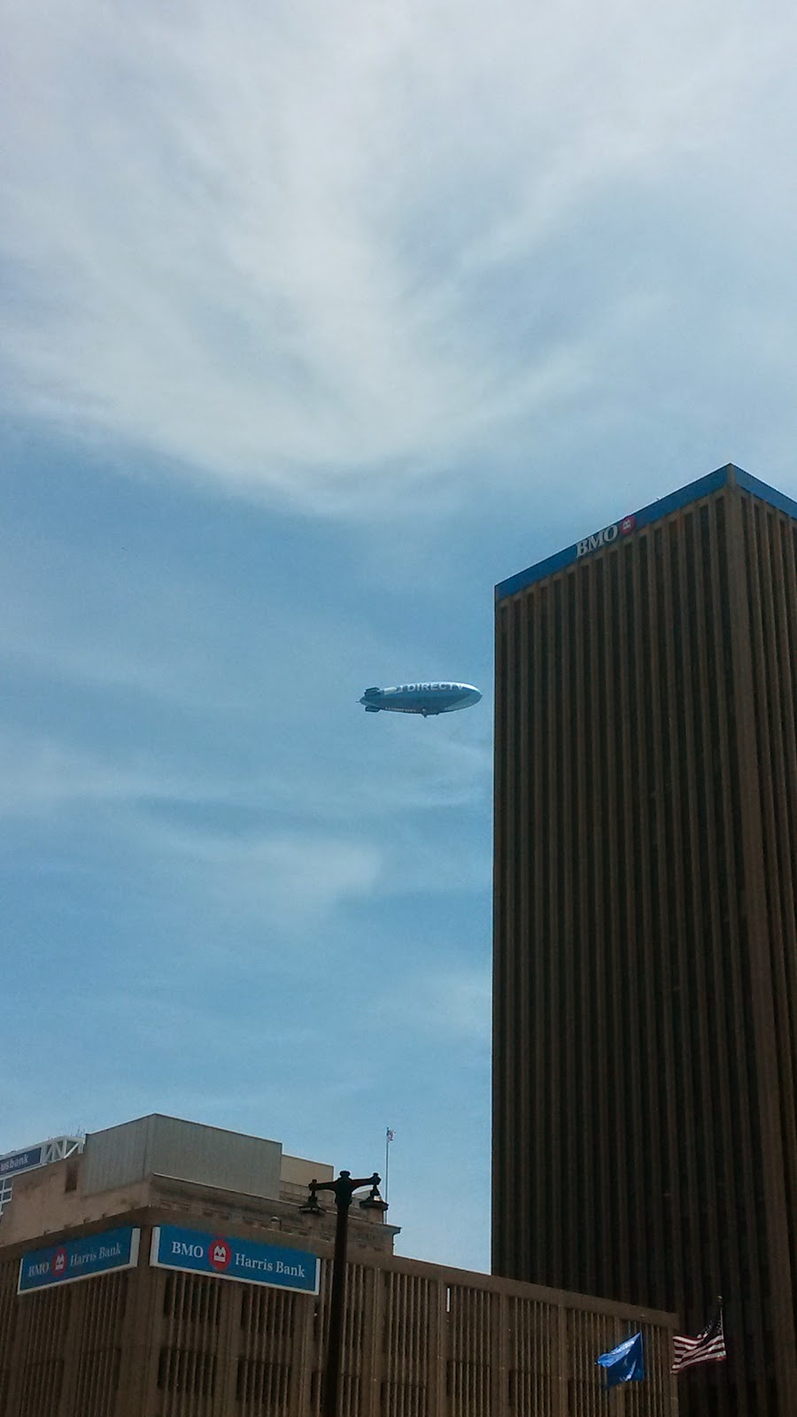 We saw the blimp hours later on our way out of town, still up there. Sweetie said "I hope they have bathrooms on the blimp because that guy's been up there a long time!"