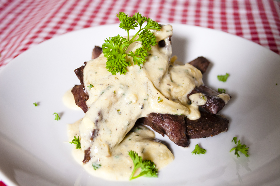 Raf's Kitchen Pan Seared Beef Heart served w/ Herby white sauce