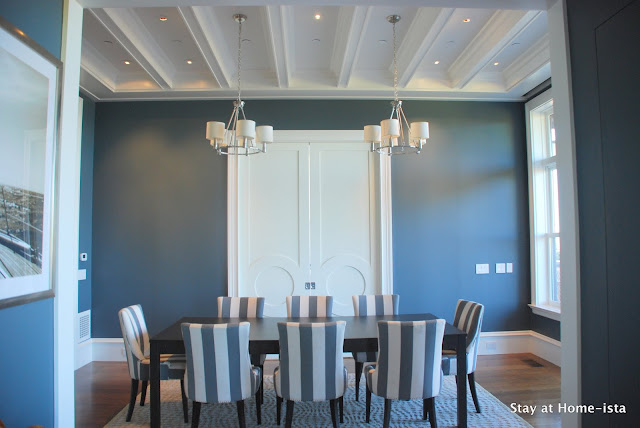 grey dining room with striped chairs