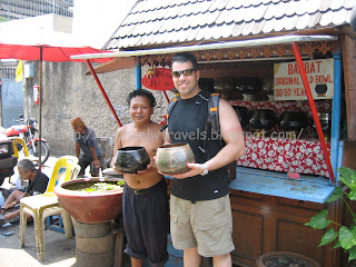 a man and woman holding bowls