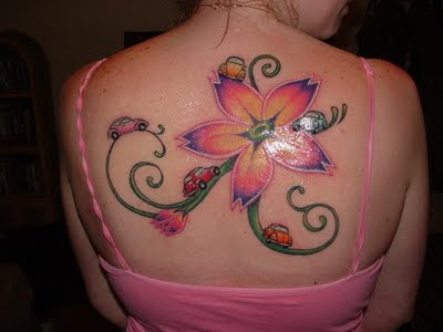 Flower tattoo designs are not only popular among the women folk 