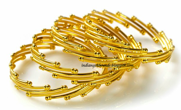 gold kangan designs tanishq