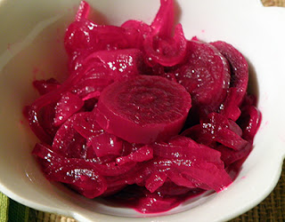 Closeup of Pickled Beets showing beet-colored onion
