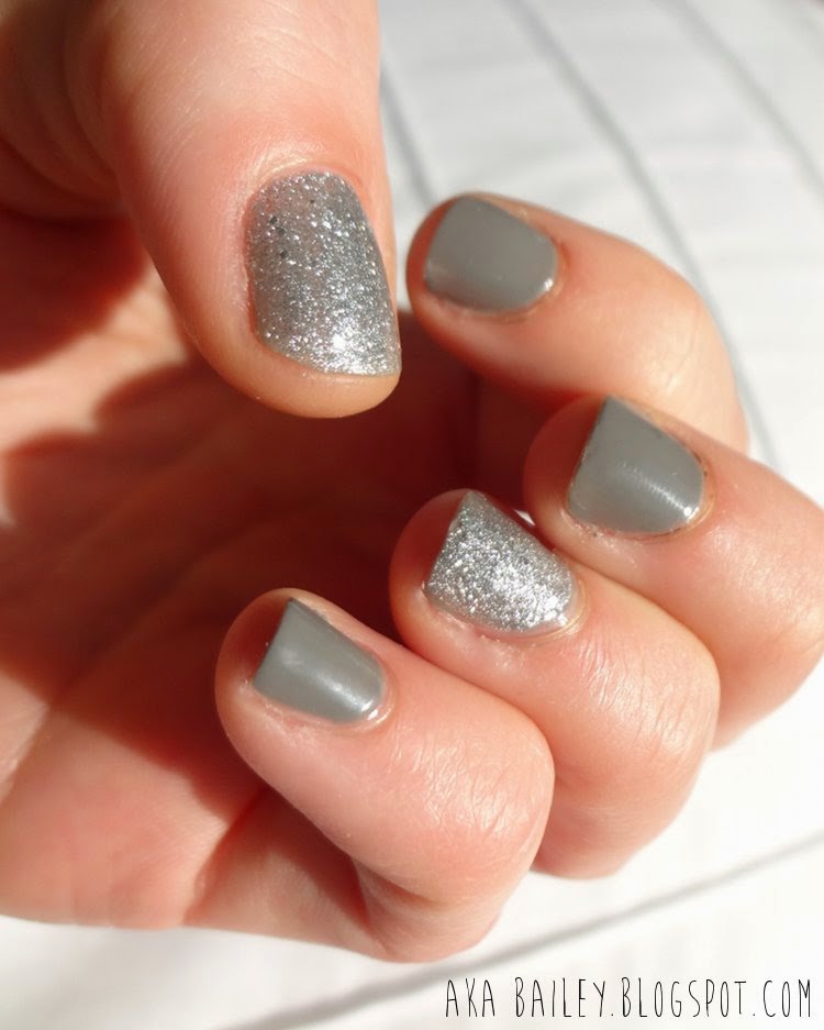 Grey nails with silver sparkly accents