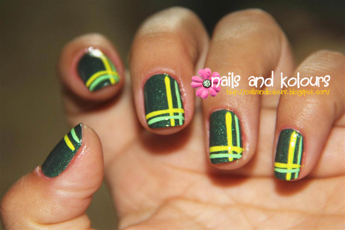 Nail Art: Double Perpendicular Lines ~ JanzCrystalz Handcrafts As promised, I hand drawn a simple design on my Emerald Green nails and I'm calling this design as