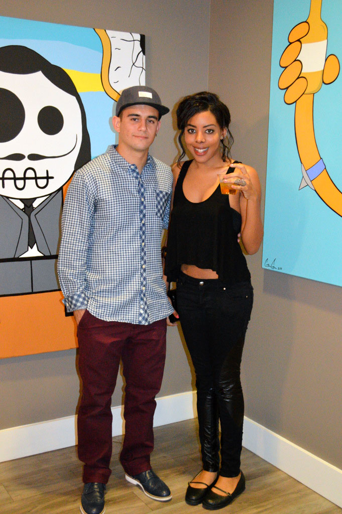 Gabriel Gimenez of GG Artwork and Fashion Blogger Anais Alexandre of Down to Stars in a high low tank, Tripp NYC leather pants and Deena and Ozzy maryjanes