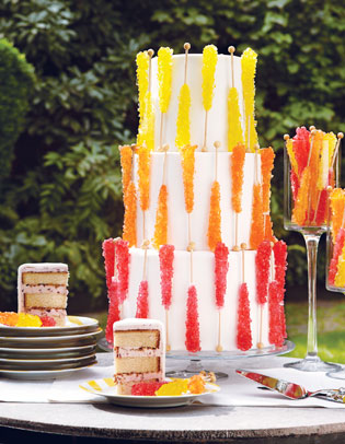 Amazing three tier wedding cake with yellow orange to red gradient created 