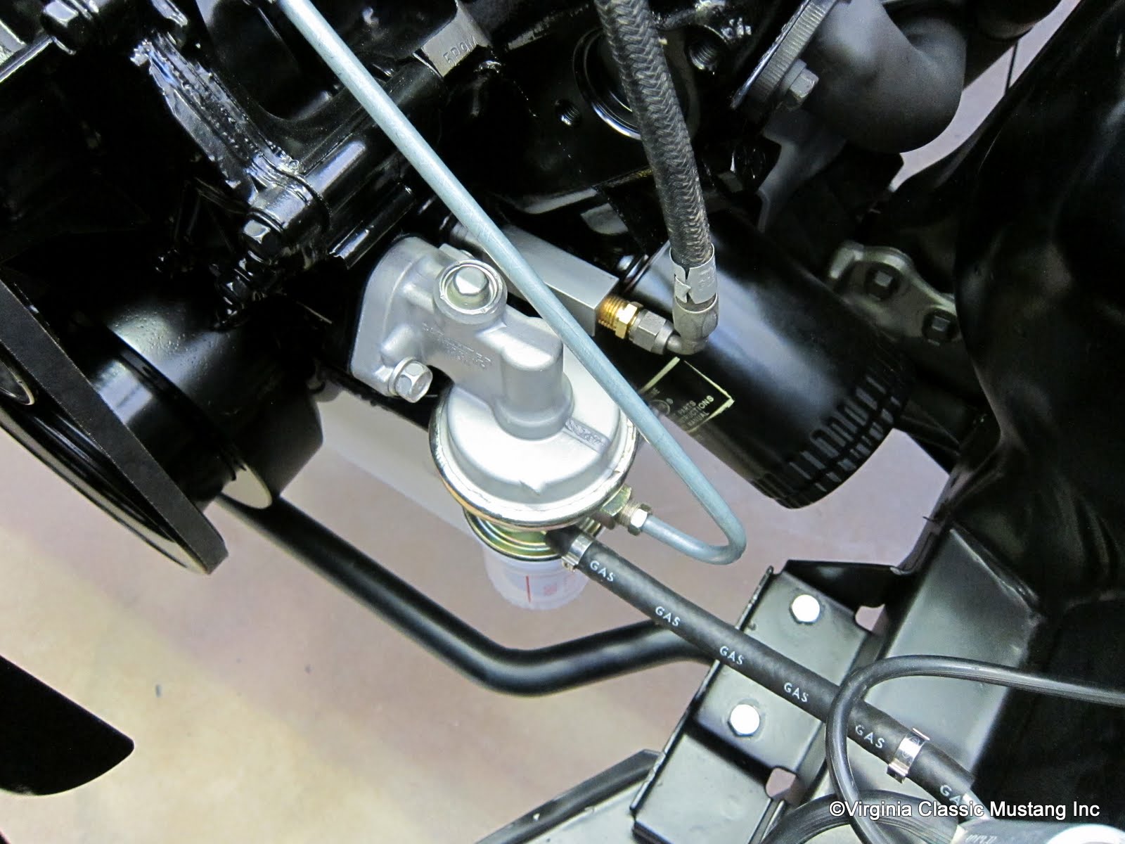 Here is the fuel pump, oil pressure block and line on the '65 GT350 Mustang.