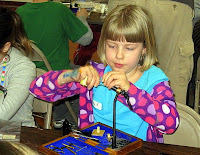 Bitterroot Buggers fly tying class Children learn how to tie dry flies