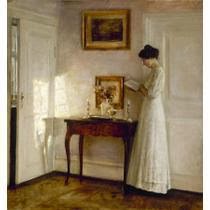 " A lady reading in an interior"