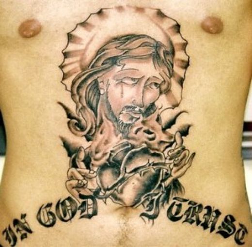 I like this religious tattoo with the words In God I Trust as it kinda 