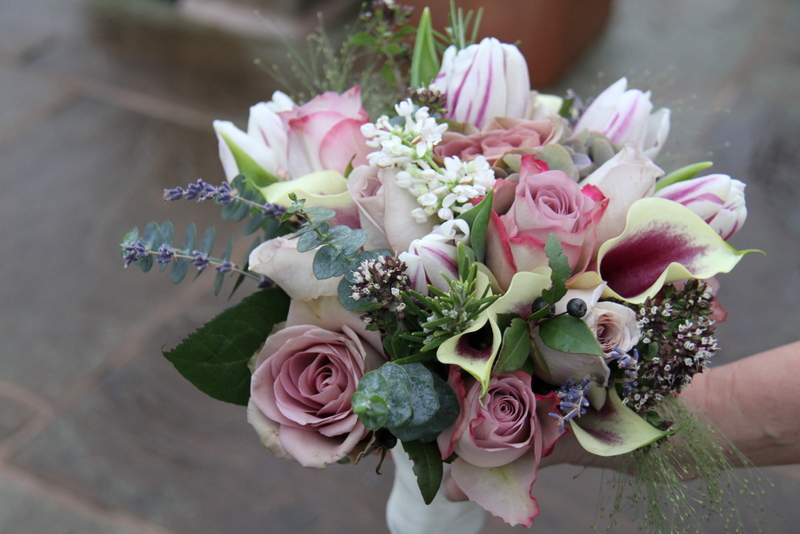 A lovely Spring Wedding Bouquet in Purple Lavender Ivory shades including 