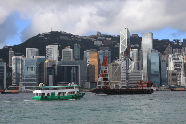 The famous landmark of Bank of China Tower along Victoria Harbour in Hong Kong The famous landmark of Bank of China Tower along Victoria Harbour in Hong Kong