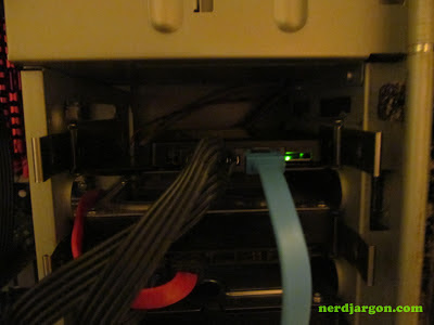 OCZ VTX3MI-25SAT3-240G Vertex 3 SSD mounted in Antec 900 case with green light OCZ VTX3MI-25SAT3-240G Vertex 3 SSD mounted in Antec 900 case with green light
