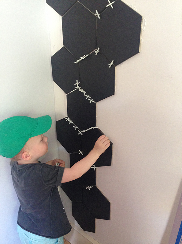 Kitchen Makover French For Pineapple Blog Boy helping with the porcelain hex tiles
