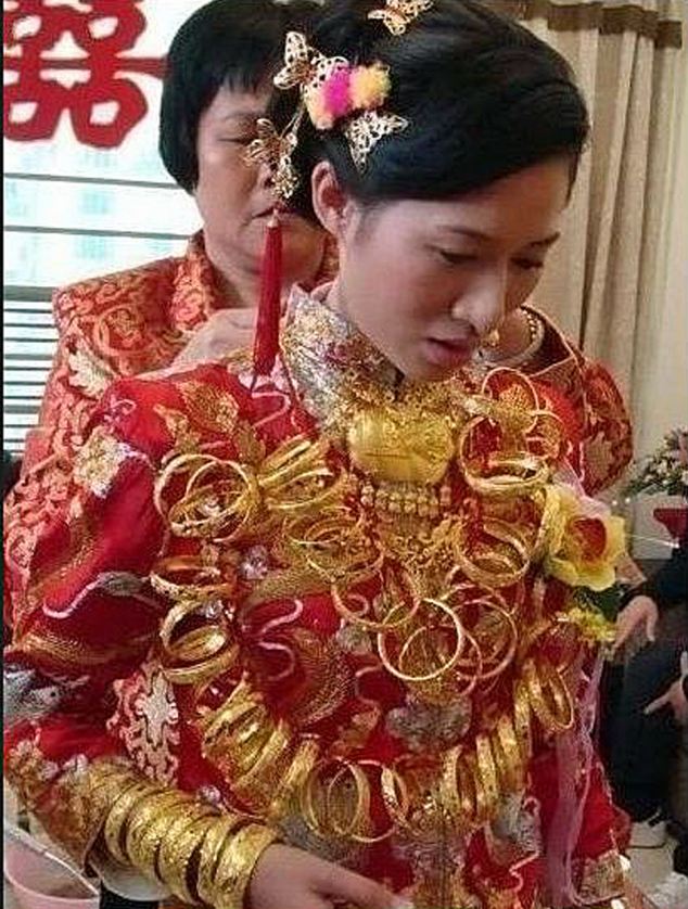 news article woman bling dynasty bride gets married wearing solid gold jewellery news article woman bling dynasty bride gets married wearing solid gold jewellery