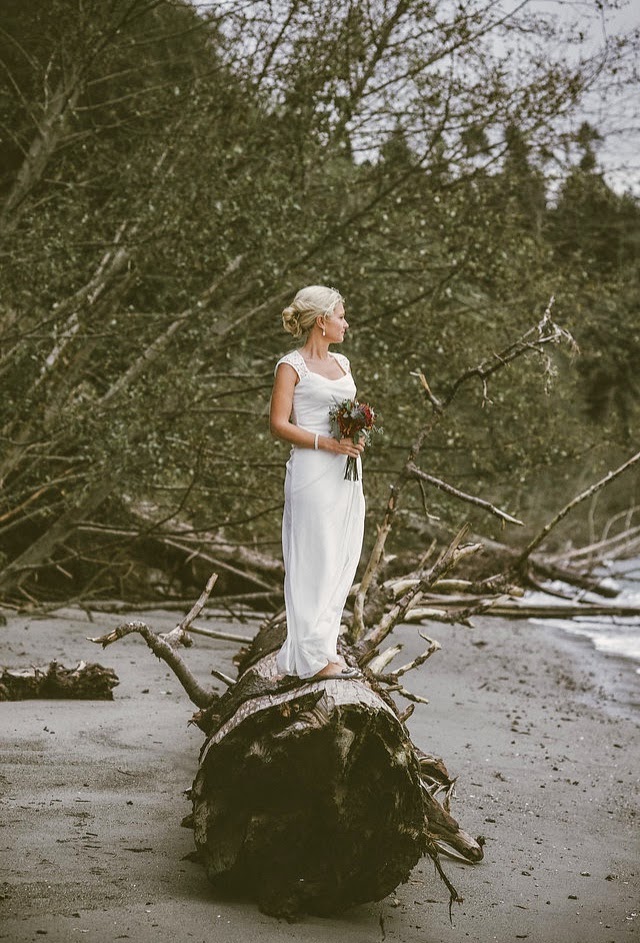 Kate is a beautiful bride, standing on driftwood - Photo by Lena Peterson Kate is a beautiful bride - Patricia Stimac, Seattle Wedding Officiant