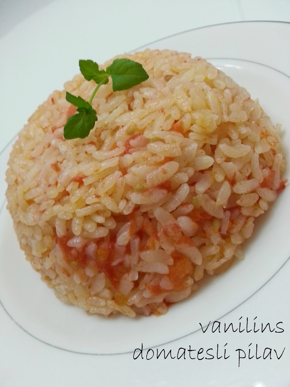 Domatesli Pirinç Pilavı Tarifi Domatesli Pirinç Pilavı Tarifi