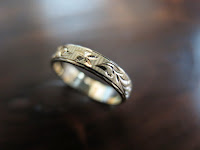 G011:中古 K18 3.0g 平打 唐草 彫り リング #12