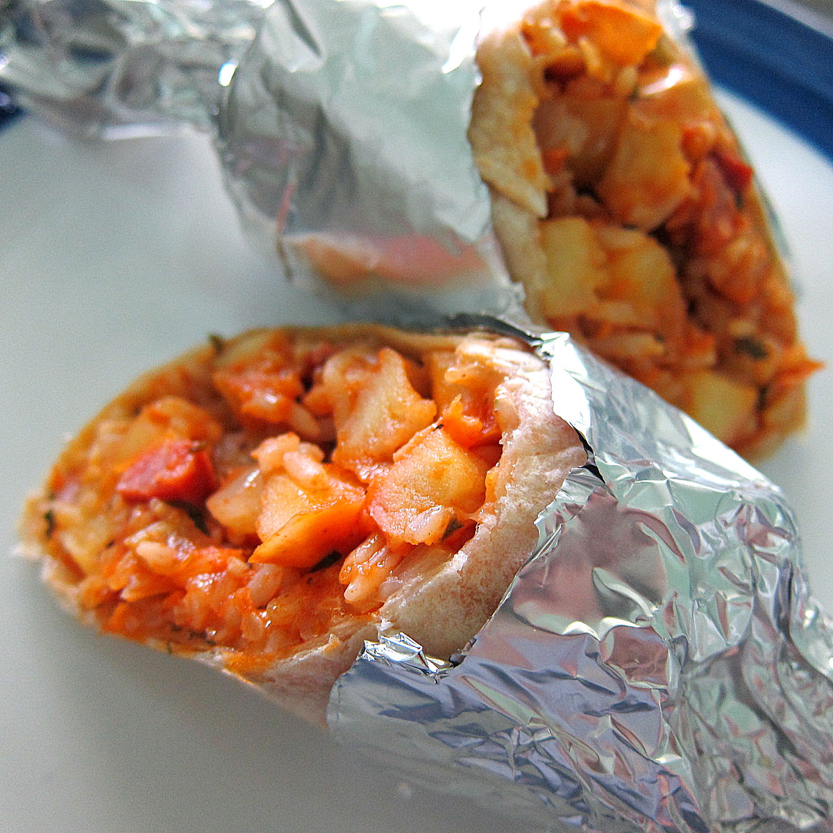 hello grenada, see you later america Apple Sausage Rice Burrito A