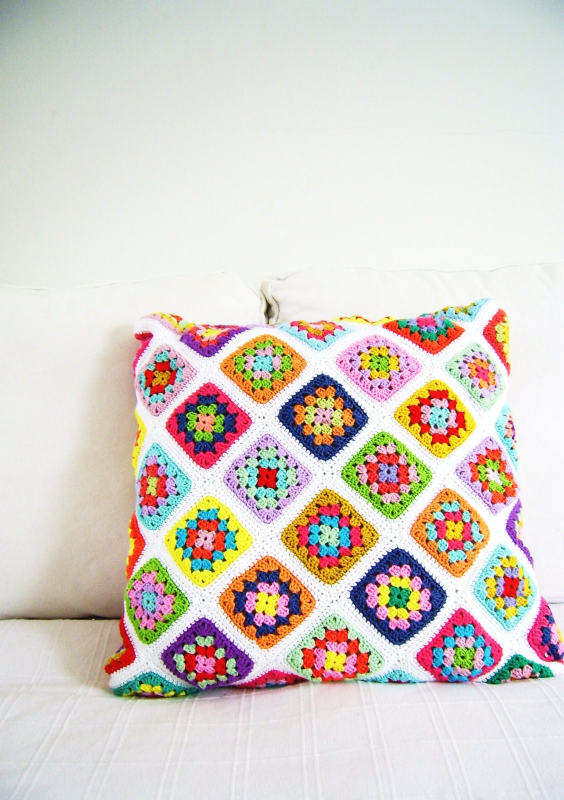 Silly Old Suitcasea Granny square pillow cover.. Granny square