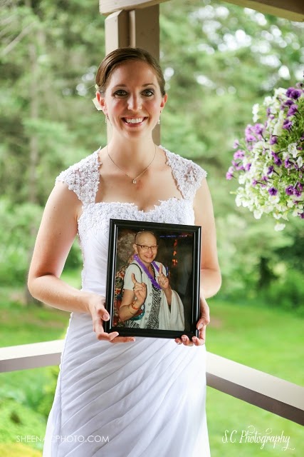 wedding day photo with deceased mother portrait bride