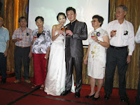 Ryan and Juliet posing for the camera during the toasting ceremony