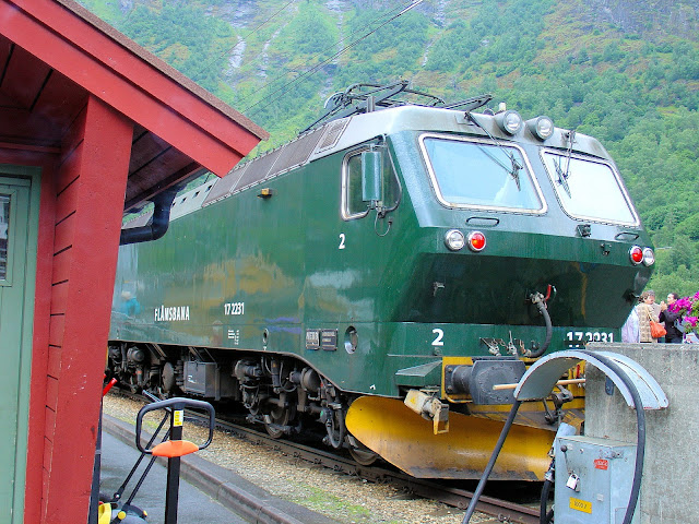 All aboard the Flåm Railway in Norway, one of the world's most scenic railway journeys! Content and photography are the property of EuroTravelogue™. Unauthorized use is prohibited.
