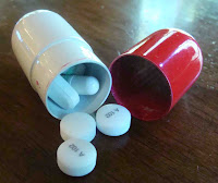 Pill Shaped Medication Container in Open Position Pill Shaped Medication Case in Open Position