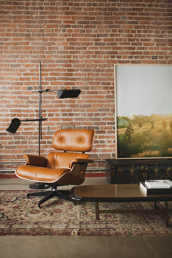 Industrial and loft interiors with bare brick walls 