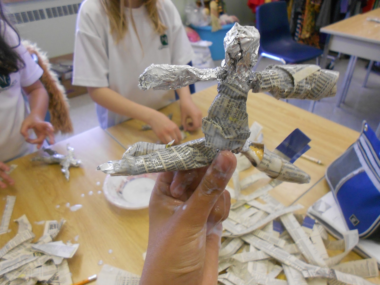 The Adventure of Teaching Paper Mache Men
