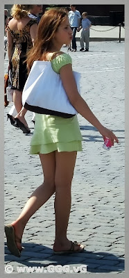 Girl wearing green summer mini dress