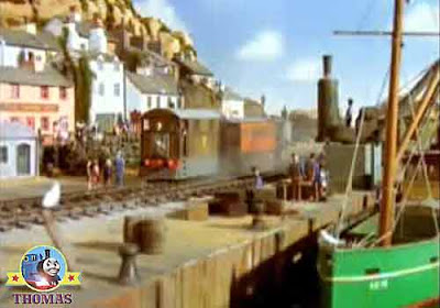 Thomas train Toby and Henrietta at coastal fishing boat harbor wharf going exploring and discovering