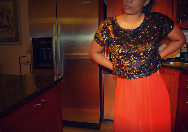 sequin crop top worn with a maxi skirt