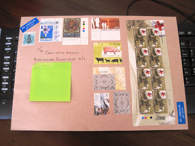 Colourful envelope with stamps to post