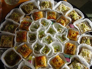 These are the recipes that we at Pars Market remember from childhood: golden Baklava, rich in walnuts, honey and crisp fillo, that actually melts in your mouth; sweet Namoura, soft and chewy, infused with coconut; pistachio-filled Ballourie, lightly baked shredded fillo, lightly sweetened; buttery Mamoul, soft and stuffed with dates, walnuts or pistachios.  Our pastry and sweet selections are filled with the sweet results of recipes created in the lands of our ancestors a thousand years ago and perfected by generations of bakery artisans.  But we could not call Pars an International Market if we limited our sweet tooth to just one tradition. That is why you will find pastries of many origins and flavors in our cases: rich Italian cookies, muffins bursting with berries, flaky croissants, buttery Danish and mouth-watering tortes.